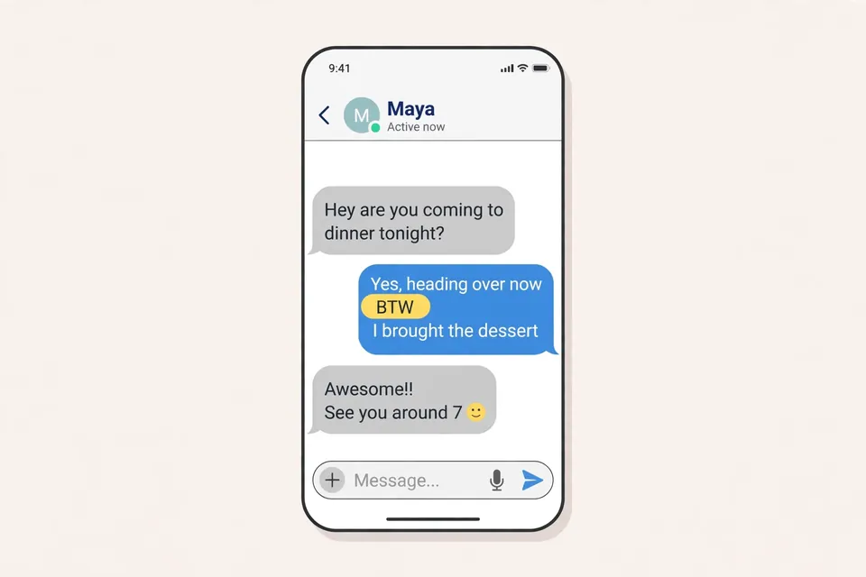 BTW meaning - smartphone showing a text conversation with BTW highlighted