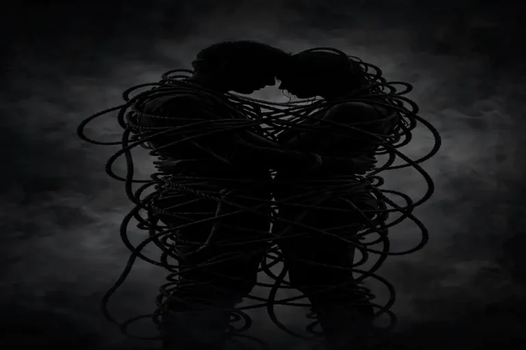 Codependency meaning - tangled couple silhouette