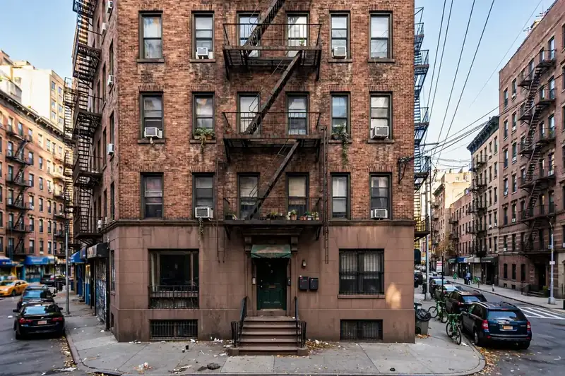 SRO meaning building - urban apartment building in city neighborhood